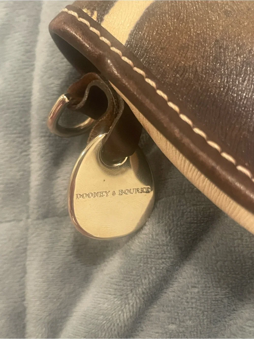 Dooney & Bourke Black and Cream Cow Print Leather Snap Wallet